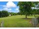 Expansive backyard featuring lush greenery and a peaceful setting at 4914 Watson Mill Ct, Loganville, GA 30052