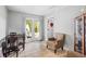 Bright breakfast nook with tile flooring, a seating area, and an exit to the backyard at 4914 Watson Mill Ct, Loganville, GA 30052