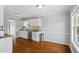Clean kitchen with stainless steel appliances, granite countertops, and ample cabinet space at 4914 Watson Mill Ct, Loganville, GA 30052