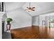 Comfortable living area with vaulted ceiling, hardwood floors, and fireplace at 4914 Watson Mill Ct, Loganville, GA 30052