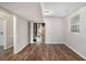 Unfinished basement with wood-look flooring and access to utilities at 1034 Sandy Ridge Rd, Mcdonough, GA 30252