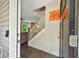 Welcoming entryway with wood floors, a staircase, and a view into the living room at 6375 Eidson Dr, Cumming, GA 30041