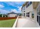 Spacious back deck with a view of the yard and neighboring homes at 6585 Canyon Cv, Cumming, GA 30028