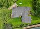 Aerial top-down view shows the architectural roof design and surrounding landscape and property lines at 905 John Ward Rd, Marietta, GA 30064