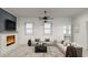 Cozy living room with a decorative fireplace, large windows, and a comfortable sectional sofa at 1161 Dahlonega Hwy # 12, Cumming, GA 30040