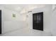 Bedroom with bright white walls and contrasting black doors at 1473 Lansing Se St, Atlanta, GA 30315