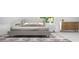 Bedroom featuring a large bed, neutral tones and modern decor at 1473 Lansing Se St, Atlanta, GA 30315