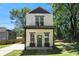 Inviting two-story home with a well-maintained lawn and a charming entrance at 1473 Lansing Se St, Atlanta, GA 30315