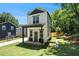 Charming two-story home with a modern design and a well-manicured lawn at 1473 Lansing Se St, Atlanta, GA 30315
