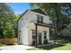 Modern two-story home with a well-kept lawn and unique architectural details at 1473 Lansing Se St, Atlanta, GA 30315