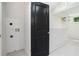 Close-up of laundry room area with washer hookups near the back door at 1473 Lansing Se St, Atlanta, GA 30315