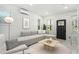 Bright living room with modern furnishings, large windows, and a minimalist design at 1473 Lansing Se St, Atlanta, GA 30315
