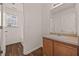 Bathroom with vanity, tile flooring, and shower with window at 211 Millstone Dr, Hampton, GA 30228