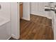 An inside perspective of the bathrooms flooring is clean and consistent with the houses theme at 211 Millstone Dr, Hampton, GA 30228