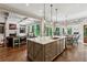 Bright eat-in kitchen featuring a central island, breakfast nook, and an open-concept design at 2115 Howell Mill Nw Rd, Atlanta, GA 30318
