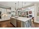 Spacious open-concept kitchen with a large island and modern stainless steel appliances at 2115 Howell Mill Nw Rd, Atlanta, GA 30318