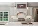 Modern kitchen featuring stainless appliances, a marble countertop island and lots of natural light at 2115 Howell Mill Nw Rd, Atlanta, GA 30318