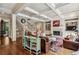 Bright open concept living room featuring a fireplace, hardwood floors and coffered ceiling at 2115 Howell Mill Nw Rd, Atlanta, GA 30318