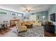Spacious living room with a comfortable seating arrangement and ample natural light at 2115 Howell Mill Nw Rd, Atlanta, GA 30318