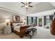 Spacious primary bedroom featuring a vaulted ceiling, and a seating area with natural light at 2115 Howell Mill Nw Rd, Atlanta, GA 30318