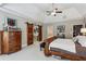 Main bedroom featuring wood accents, decorative sliding doors, and ample natural light at 2115 Howell Mill Nw Rd, Atlanta, GA 30318