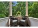 Cozy porch with chairs overlooking a lush landscape at 2115 Howell Mill Nw Rd, Atlanta, GA 30318