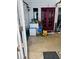 Unkempt backyard featuring a generator, washer, and cluttered storage at 4312 Idlewood Ln, Tucker, GA 30084
