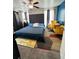 A view of a bedroom featuring a comfortable bed and colorful accents at 4312 Idlewood Ln, Tucker, GA 30084