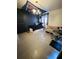 Well-lit bedroom features unique decor, tile flooring, and barn door at 4312 Idlewood Ln, Tucker, GA 30084