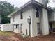 The side exterior shows the home's architecture and surrounding landscape at 4312 Idlewood Ln, Tucker, GA 30084