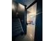 A hallway leads to the room with gray flooring and dark gray wall color at 4312 Idlewood Ln, Tucker, GA 30084