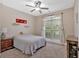Comfortable bedroom featuring neutral colors and natural light from the window at 7030 Mandevilla Ln, Douglasville, GA 30135