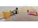 Carpeted bonus room with a desk, bed, and window at 7030 Mandevilla Ln, Douglasville, GA 30135