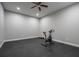 Dedicated gym area featuring an exercise bike and padded flooring, ideal for workouts at 799 Wagon Trl, Woodstock, GA 30188