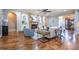 Bright living room with hardwood floors, built-in shelves, and a cozy fireplace for relaxation at 799 Wagon Trl, Woodstock, GA 30188