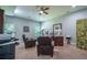 Well-lit office space with multiple monitors, comfortable seating, and ample natural light at 799 Wagon Trl, Woodstock, GA 30188