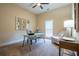 Office with carpet, neutral walls, a window with blinds, and glass table at 799 Wagon Trl, Woodstock, GA 30188
