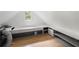 Attic with built in bed and storage along with a window offering natural light at 1104 Warrenhall Ne Ln, Brookhaven, GA 30319