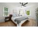 Comfortable bedroom with natural light, hardwood floors, and neutral decor at 1104 Warrenhall Ne Ln, Brookhaven, GA 30319