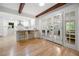 Modern kitchen featuring a breakfast bar with views into the sunroom at 1104 Warrenhall Ne Ln, Brookhaven, GA 30319