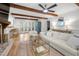 Spacious living room seamlessly connects to the kitchen and adjoining sunroom at 1104 Warrenhall Ne Ln, Brookhaven, GA 30319