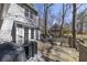 Back of the house features a spacious deck with seating and a grill, perfect for outdoor gatherings at 3271 Sutcliffe Nw Rdg, Marietta, GA 30064