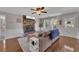 Inviting living room with a brick fireplace, hardwood flooring, and a cozy sofa, perfect for relaxation and entertaining at 3271 Sutcliffe Nw Rdg, Marietta, GA 30064