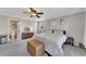 Spacious main bedroom with carpet, ceiling fan, and easy access to an ensuite bathroom at 3271 Sutcliffe Nw Rdg, Marietta, GA 30064