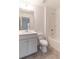 Bathroom featuring a single sink vanity and a shower/tub combo at 429 Stovall Pl, Woodstock, GA 30188