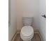 Cozy half bath with a toilet and a window at 429 Stovall Pl, Woodstock, GA 30188