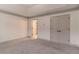 Neutral bedroom with double closets and entry to the bathroom at 429 Stovall Pl, Woodstock, GA 30188