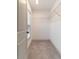 Walk-in closet with carpeted floor and wire shelving at 429 Stovall Pl, Woodstock, GA 30188