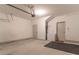 Two car garage with doors, and a storage appliance at 429 Stovall Pl, Woodstock, GA 30188