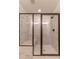 Modern bathroom with a glass-enclosed shower featuring marble tile at 429 Stovall Pl, Woodstock, GA 30188